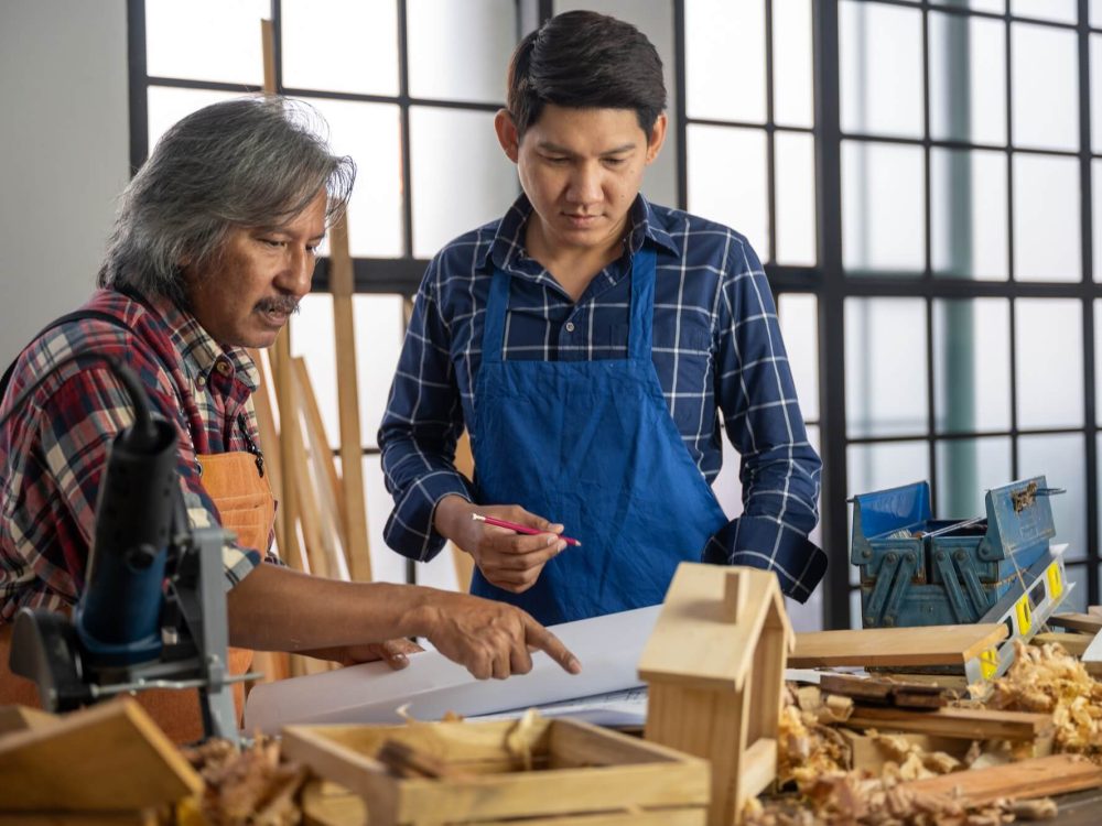two-carpenters-making-diy-craft-wood-product-and-construction-material-furniture-of-carpentry-1.jpg